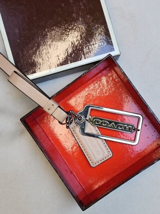 Coach Accessories - EUC bundle COACH 3 piece Keychains tan, silver WITH COACH gift box
